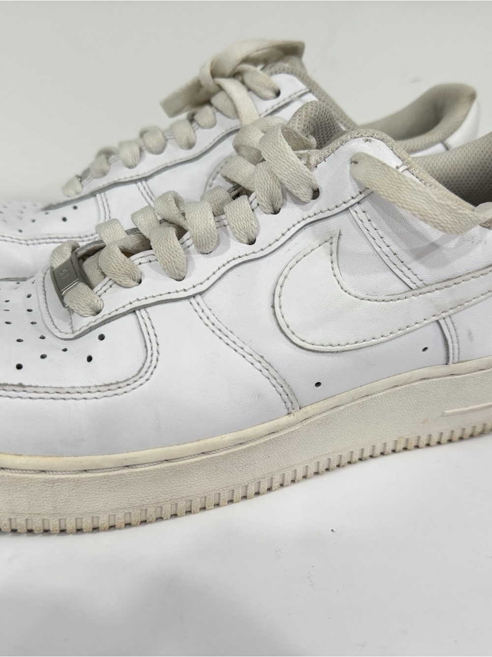 Nike Men’s White Leather Low-Top Sneakers with Off-White Accents